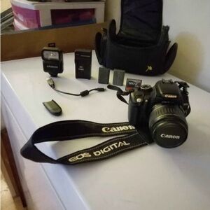 Canon EOS Rebel XT, lens, Much extra gear